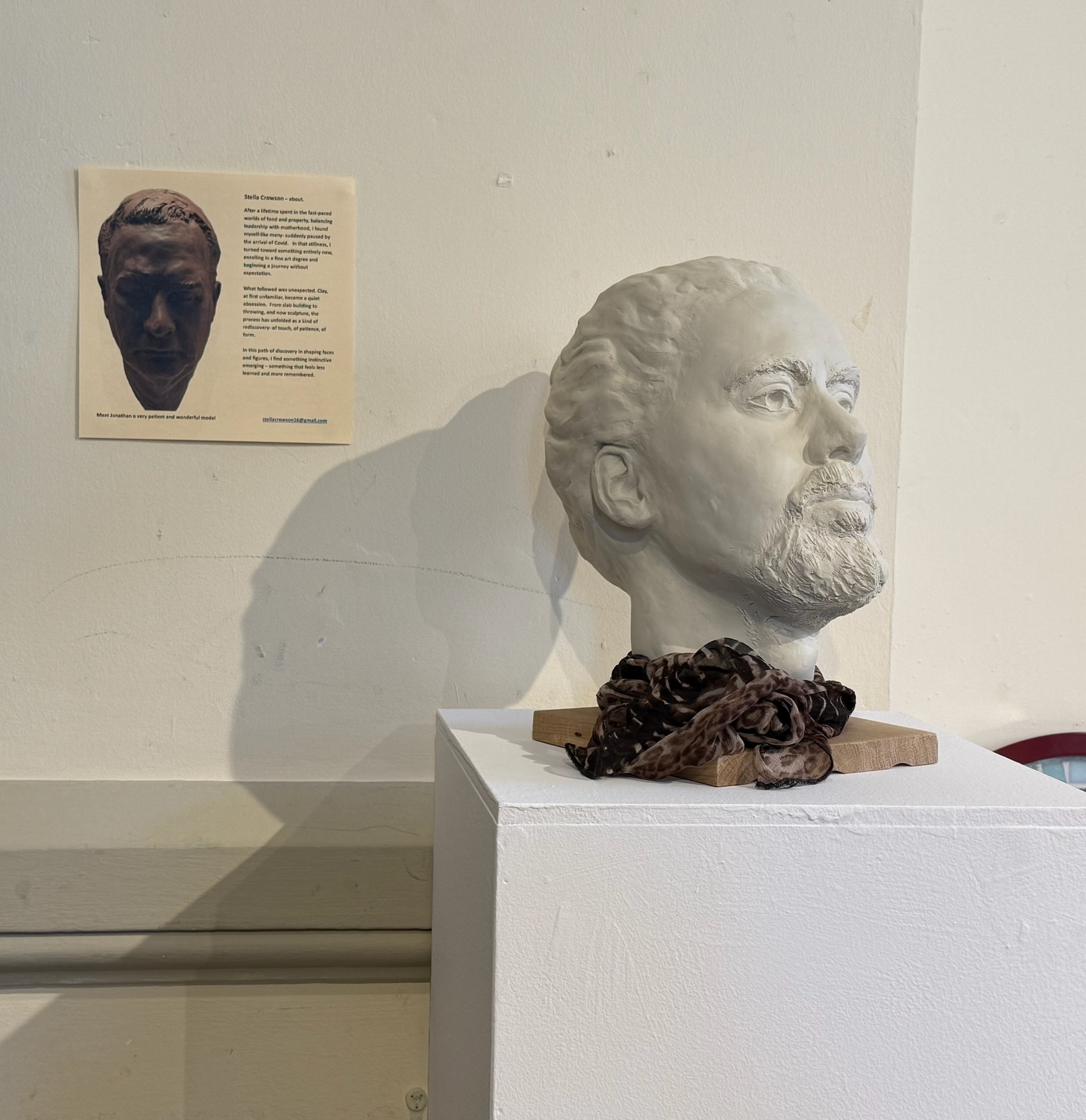 Finished plaster portrait bust at craft fair