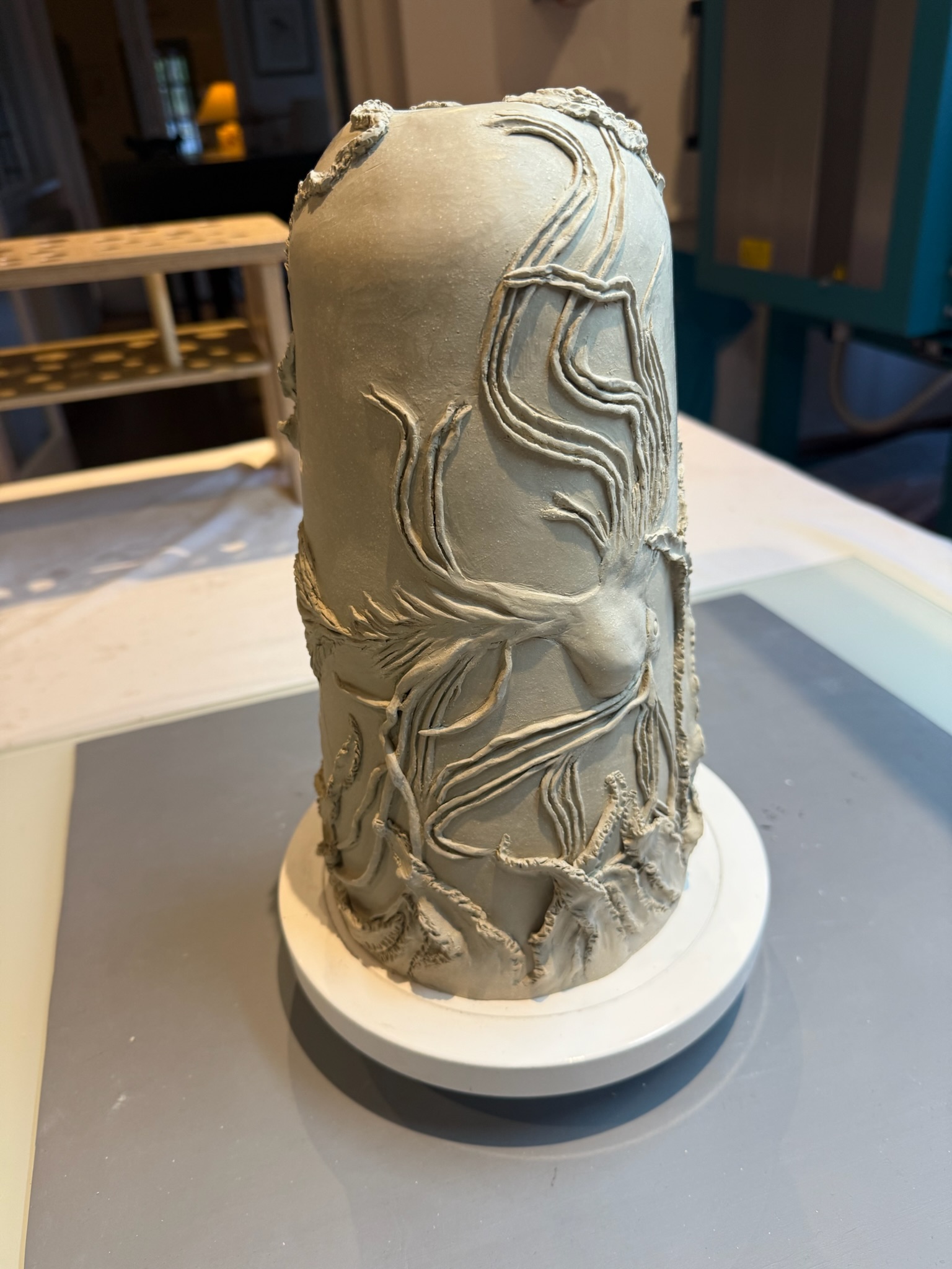 Carved abstract slab stele form
