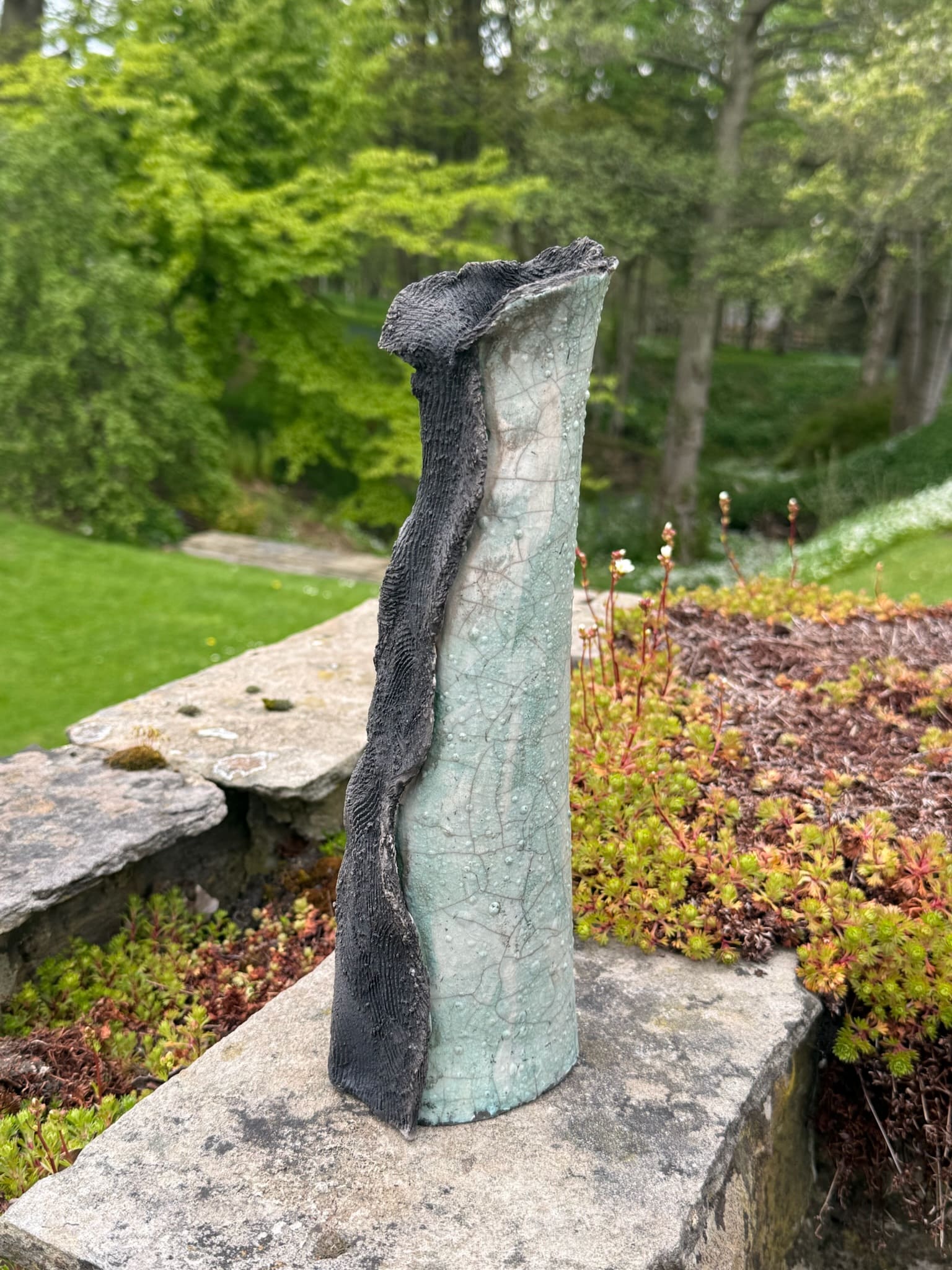 Two-tone hooded vessel, charcoal and celadon glaze