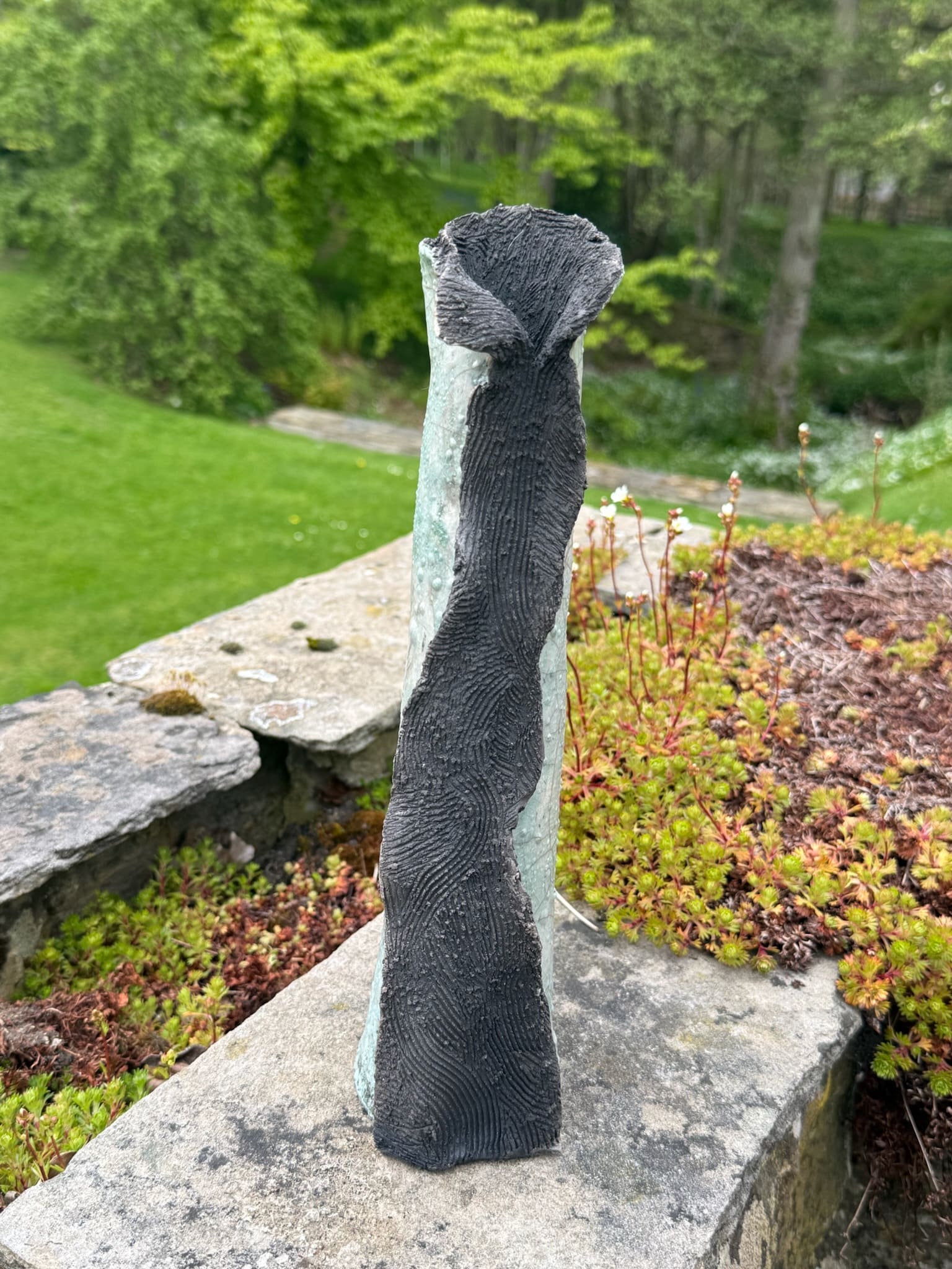 Two-tone hooded vessel, textured charcoal and celadon glaze