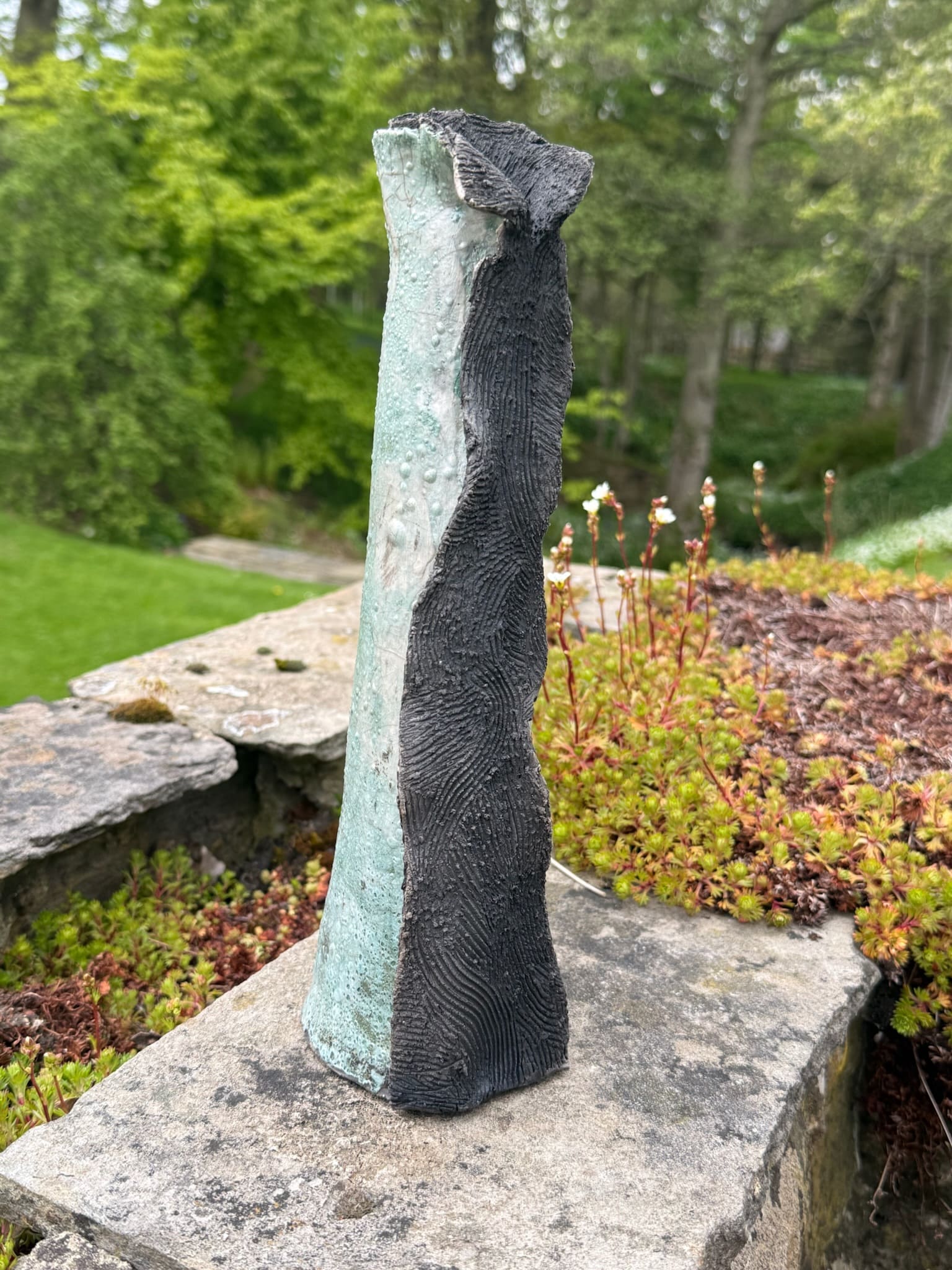 Two-tone hooded vessel, celadon and textured charcoal glaze